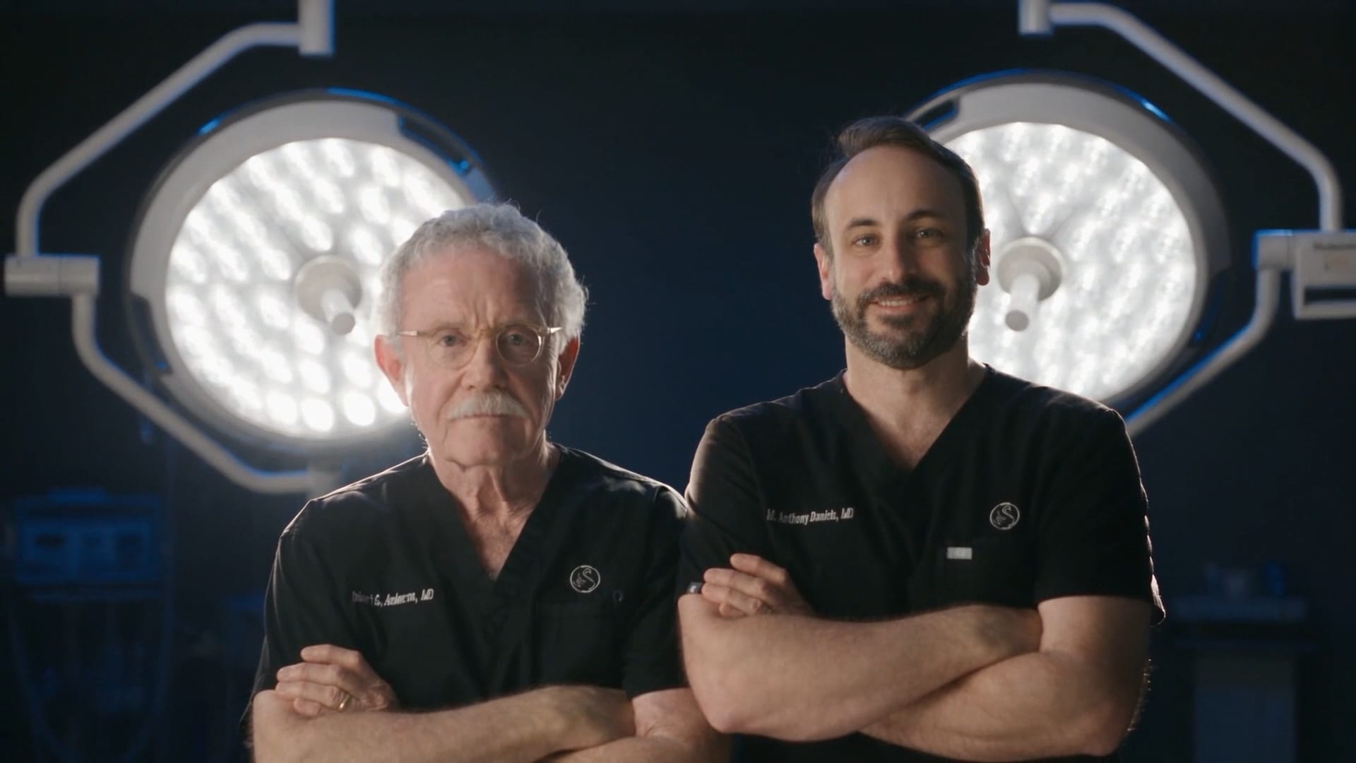 Dr. Robert G. Anderson and Dr. Mark Anthony Daniels in the operating room at Fort Worth Plastic Surgery